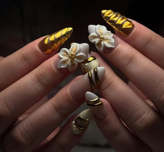 3D white flowers with gold chrome nail art